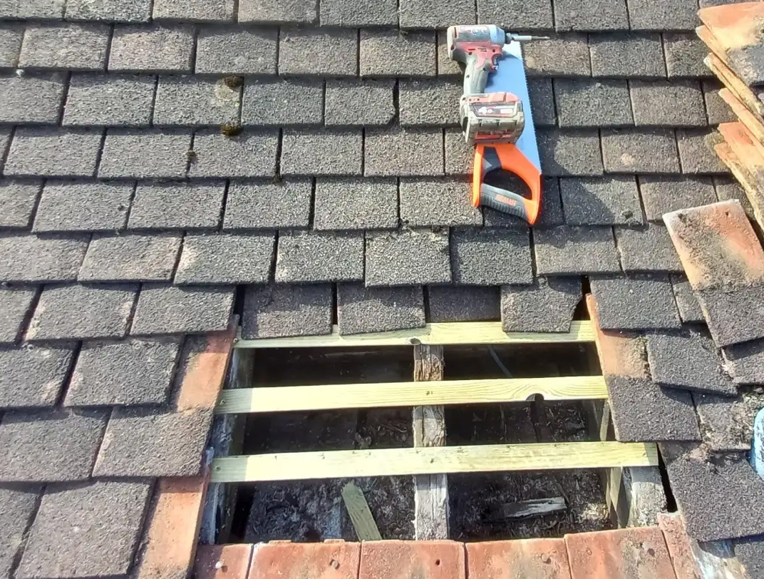 Roof repairs on a tiled roof in Bristol